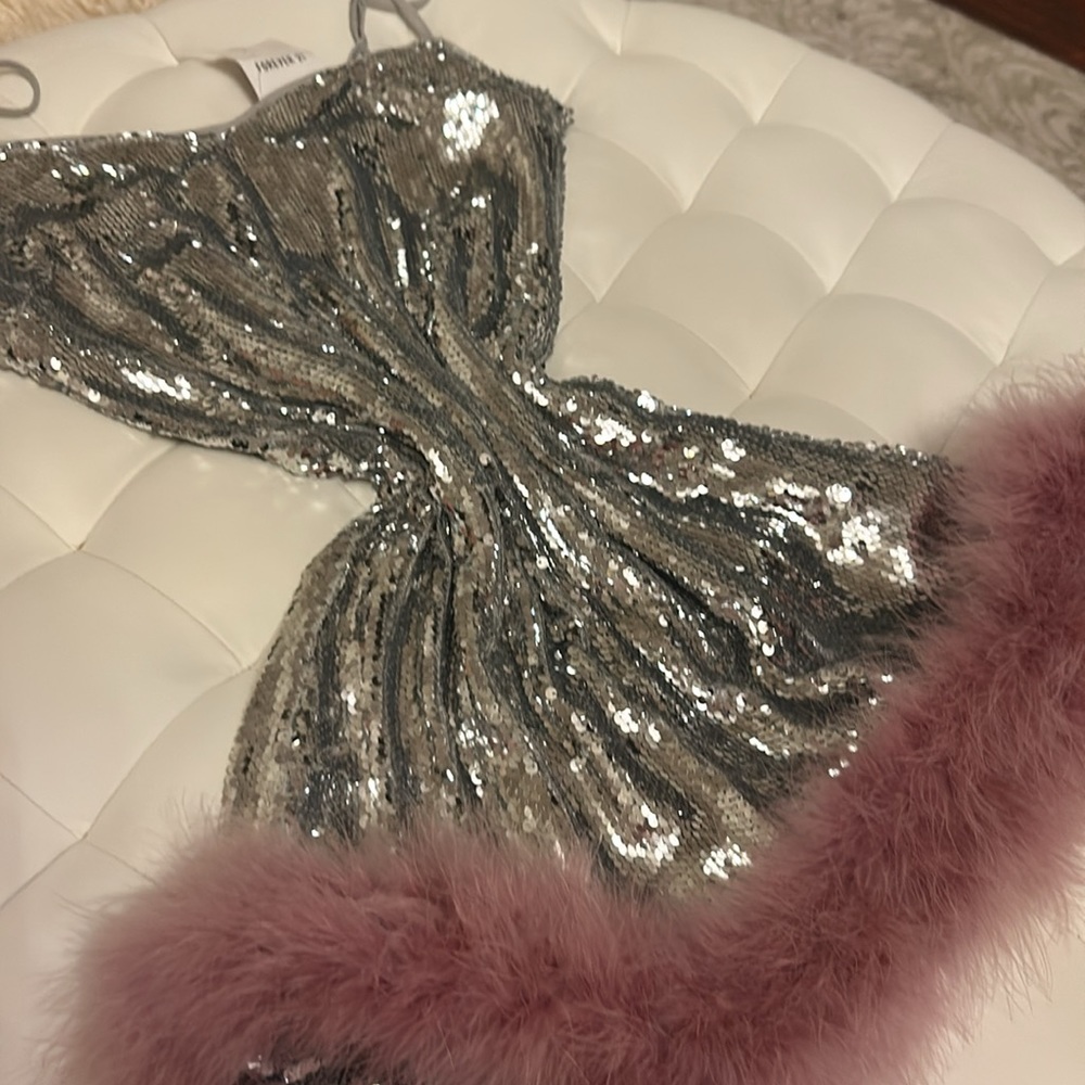 Party Dress. New with Tags. Available in S, M, L.